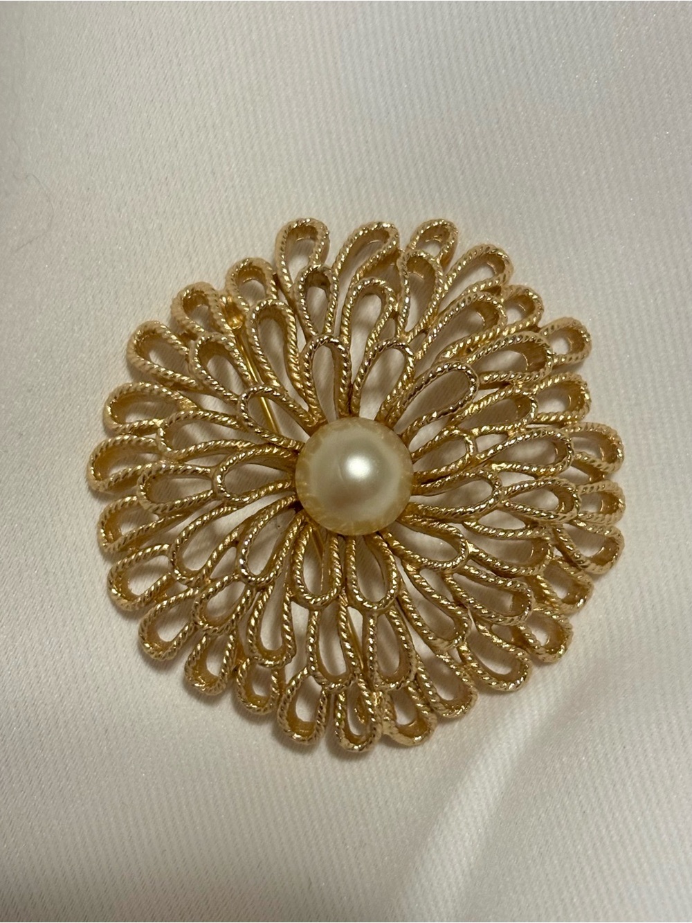 Vintage signed Trifari gold tone floral brooch with faux pearl